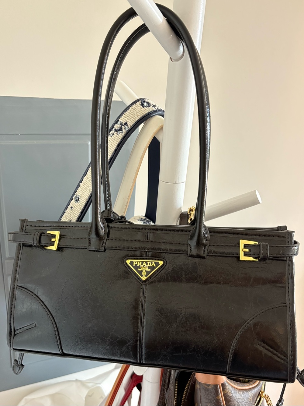 Prada Black Leather Shoulder Bag with Gold-Tone Logo